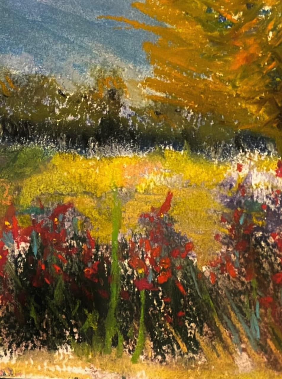 Pastel landscape of red wildflowers and golden grass with hazy blue mountains and an orange tree