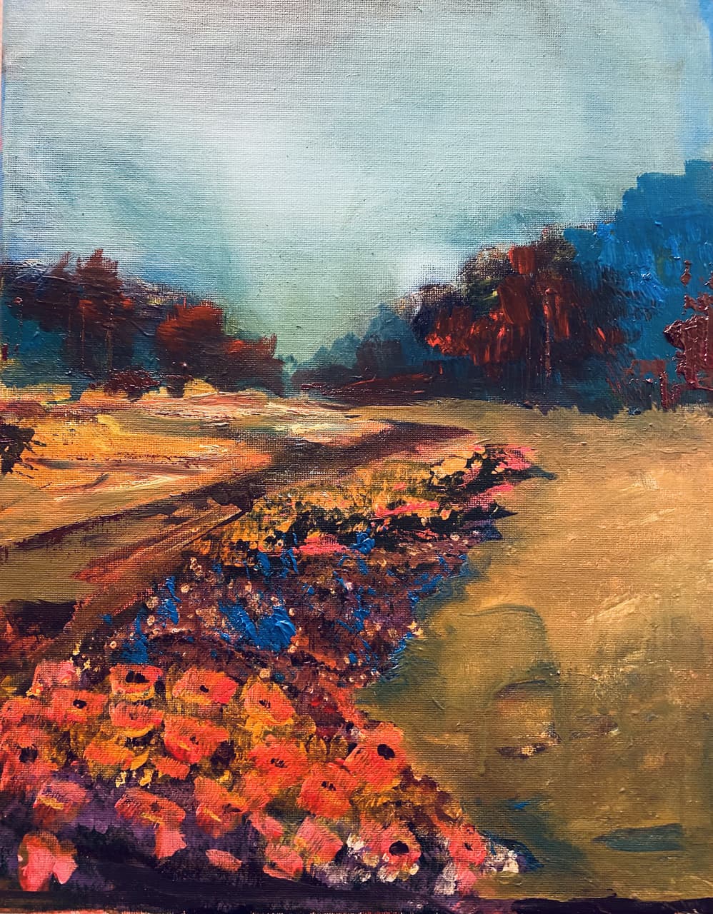 Acrylic landscape of red poppies and wildflowers on a hillside with blue mountains in the background